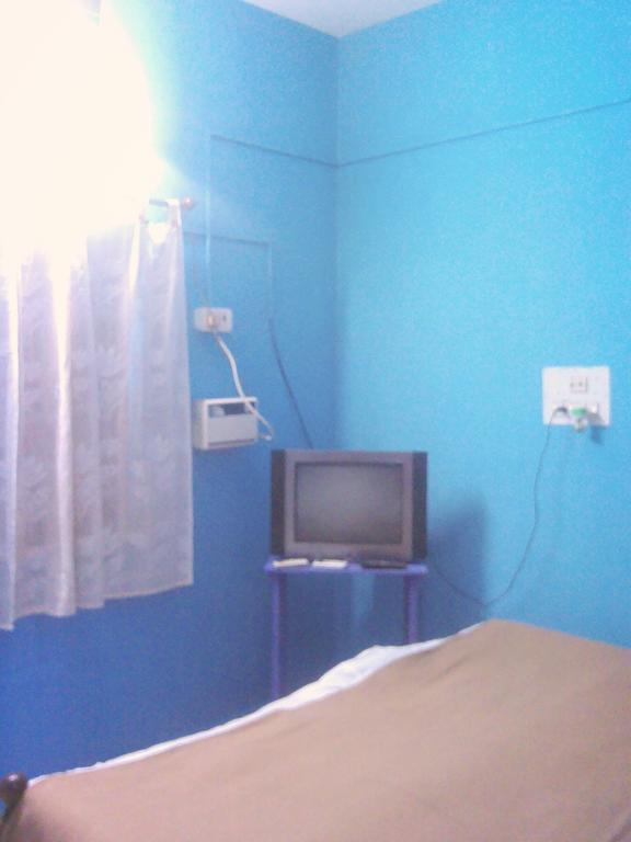 White Pearl Guest House Морджим Номер фото