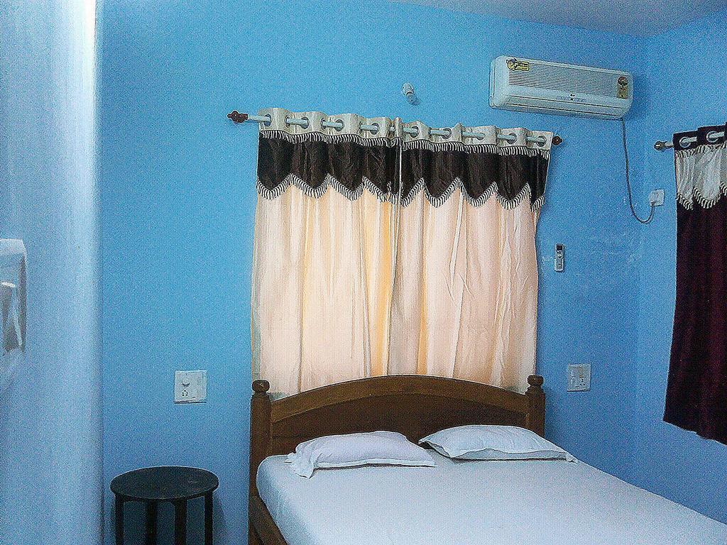 White Pearl Guest House Морджим Номер фото