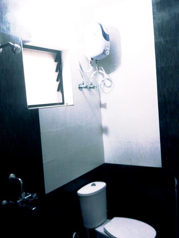 White Pearl Guest House Морджим Номер фото