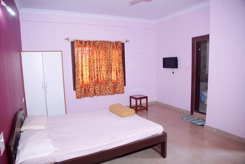 White Pearl Guest House Морджим Номер фото